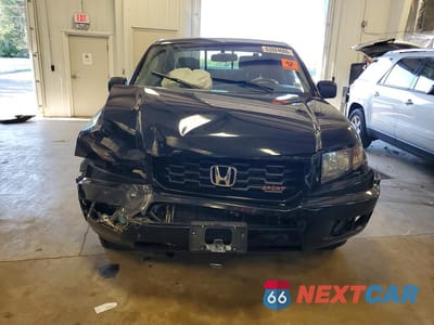 Piąte zdjęcie samochodu w środku: 2014 HONDA RIDGELINE SPORT VIN:5FPYK1F71EB006803 - miniatura