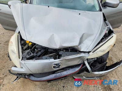 Zdjęcie 12 z 13 samochodu: 2012 MAZDA 5 VIN:JM1CW2CL7C0137826 - miniatura