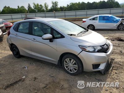 Czwarte zdjęcie samochodu z boku: 2015 HONDA FIT LX VIN:3HGGK5H53FM710653 - miniatura