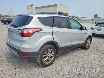 Trzecie zdjęcie samochodu z tyłu: 2017 FORD ESCAPE SE VIN:1FMCU0GD2HUE90760 - miniatura