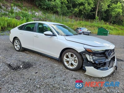 Czwarte zdjęcie samochodu z boku: 2023 HONDA ACCORD LX VIN:1HGCY1F24PA036803 - miniatura