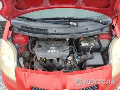 Zdjęcie 12 z 14 samochodu: 2007 TOYOTA YARIS BASE VIN:JTDJT923175095527 - miniatura