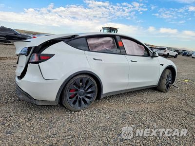 Trzecie zdjęcie samochodu z tyłu: 2023 TESLA MODEL Y VIN:7SAYGDEF1PF712860 - miniatura