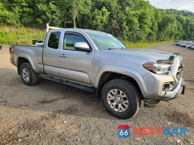 Czwarte zdjęcie samochodu z boku: 2016 TOYOTA TACOMA SR5 VIN:5TFSX5EN3GX043917 - miniatura