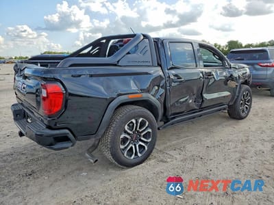 Trzecie zdjęcie samochodu z tyłu: 2025 GMC CANYON AT4 VIN:1GTP2DEK2S1155057 - miniatura