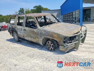 Czwarte zdjęcie samochodu z boku: 1995 CHEVROLET TAHOE K1500 VIN:1GNEK13K9SJ461947 - miniatura