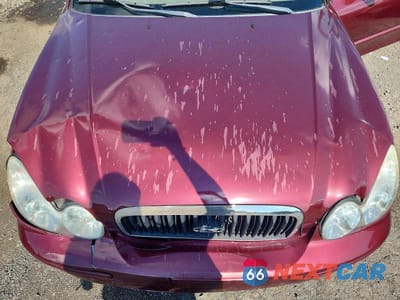 Zdjęcie 11 z 12 samochodu: 2003 HYUNDAI SONATA BASE VIN:KMHWF25H33A855465 - miniatura