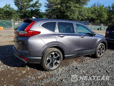 Trzecie zdjęcie samochodu z tyłu: 2018 HONDA CR-V EXL VIN:7FARW2H80JE092276 - miniatura