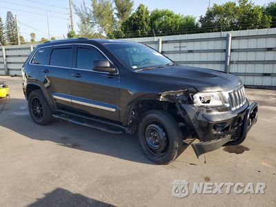 Czwarte zdjęcie samochodu z boku: 2012 JEEP GRAND CHEROKEE LAREDO VIN:1C4RJEAG5CC277503 - miniatura