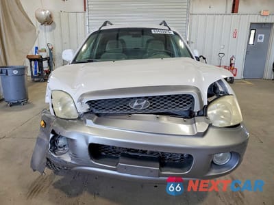 Piąte zdjęcie samochodu w środku: 2004 HYUNDAI SANTA FE GLS VIN:KM8SC73D64U722283 - miniatura