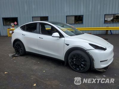 Czwarte zdjęcie samochodu z boku: 2023 TESLA MODEL Y VIN:7SAYGDEEXPF685715 - miniatura