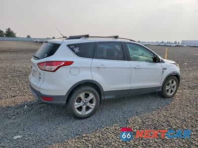 Trzecie zdjęcie samochodu z tyłu: 2014 FORD ESCAPE SE VIN:1FMCU9GX1EUE41592 - miniatura