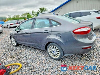 Drugie zdjęcie samochodu z przodu: 2015 FORD FIESTA TITANIUM VIN:3FADP4CJXFM105777 - miniatura