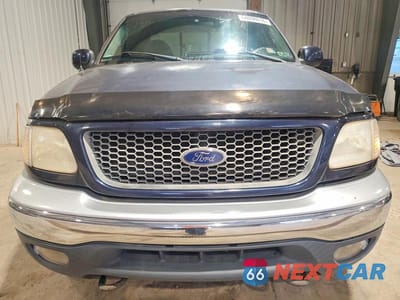 Piąte zdjęcie samochodu w środku: 2000 FORD F150 VIN:1FTRX18WXYNC25025 - miniatura