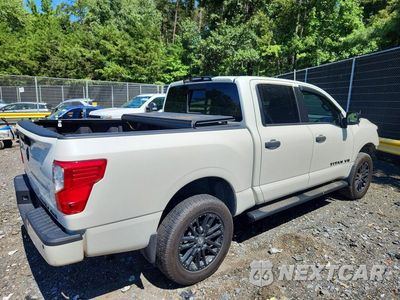 Trzecie zdjęcie samochodu z tyłu: 2019 NISSAN TITAN SV VIN:1N6AA1E55KN529443 - miniatura