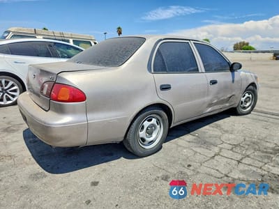 Trzecie zdjęcie samochodu z tyłu: 1999 TOYOTA COROLLA VE VIN:1NXBR12E5XZ155283 - miniatura