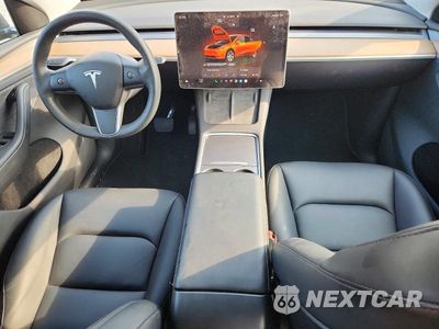 Zdjęcie 8 z 12 samochodu: 2023 TESLA MODEL Y VIN:7SAYGDEE6PA211659 - miniatura