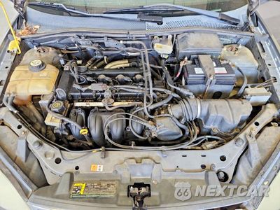 Zdjęcie 11 z 12 samochodu: 2006 FORD FOCUS ZX4 VIN:1FAFP34N06W237385 - miniatura