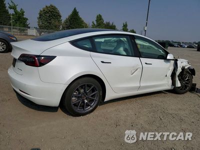 Trzecie zdjęcie samochodu z tyłu: 2022 TESLA MODEL 3 VIN:5YJ3E1EB1NF343164 - miniatura