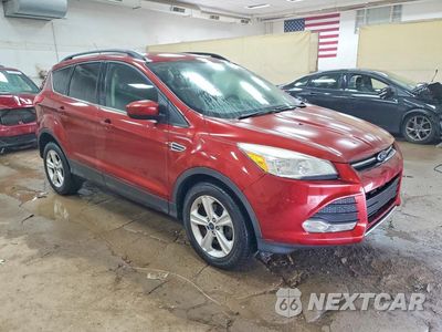 Czwarte zdjęcie samochodu z boku: 2014 FORD ESCAPE SE VIN:1FMCU0GX6EUD14851 - miniatura