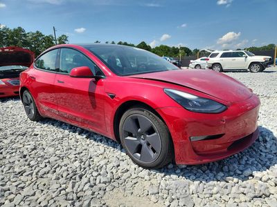 Czwarte zdjęcie samochodu z boku: 2022 TESLA MODEL 3 VIN:5YJ3E1EBXNF256329 - miniatura