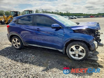 Czwarte zdjęcie samochodu z boku: 2016 HONDA HR-V LX VIN:3CZRU5H30GM705888 - miniatura