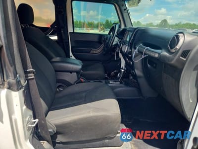 Zdjęcie 11 z 13 samochodu: 2016 JEEP WRANGLER SPORT VIN:1C4AJWAG7GL124727 - miniatura