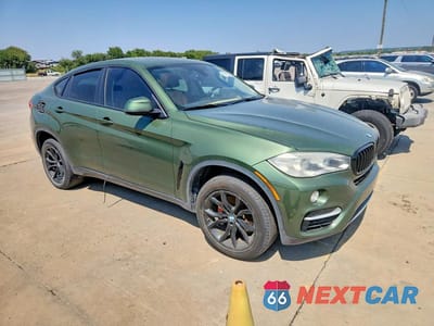 Czwarte zdjęcie samochodu z boku: 2015 BMW X6 SDRIVE35I VIN:5UXKU0C54F0F91741 - miniatura