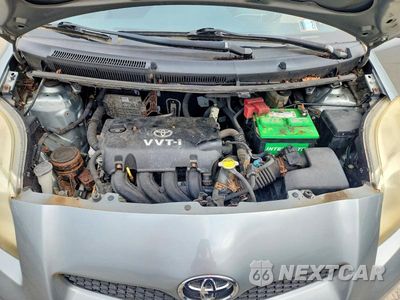 Zdjęcie 11 z 12 samochodu: 2009 TOYOTA YARIS BASE VIN:JTDJT903495240310 - miniatura
