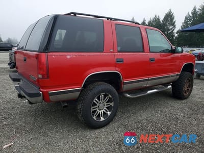 Trzecie zdjęcie samochodu z tyłu: 1998 CHEVROLET TAHOE K1500 VIN:1GNEK13R7WJ338778 - miniatura