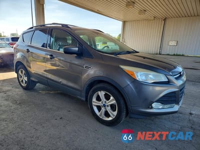 Czwarte zdjęcie samochodu z boku: 2014 FORD ESCAPE SE VIN:1FMCU9GXXEUA26156 - miniatura