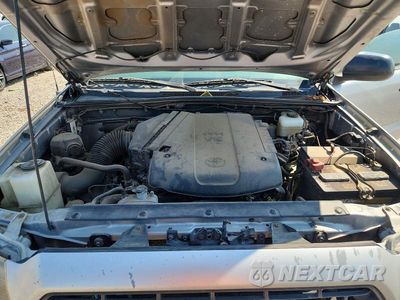 Zdjęcie 11 z 12 samochodu: 2015 TOYOTA TACOMA V6 VIN:3TMLU4EN4FM182949 - miniatura