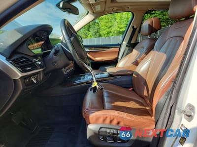 Zdjęcie 7 z 13 samochodu: 2014 BMW X5 XDRIVE35I VIN:5UXKR0C53E0H18351 - miniatura