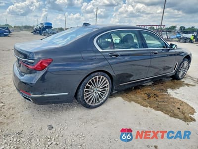 Trzecie zdjęcie samochodu z tyłu: 2022 BMW 750 XI VIN:WBA7U2C02NCJ91319 - miniatura