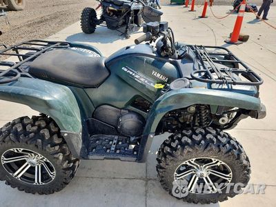 Piąte zdjęcie samochodu w środku: 2011 YAMAHA GRIZZLY ATV VIN:JY4AM13Y5BC036363 - miniatura