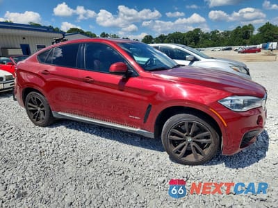Czwarte zdjęcie samochodu z boku: 2015 BMW X6 XDRIVE50I VIN:5UXKU6C54F0F94206 - miniatura