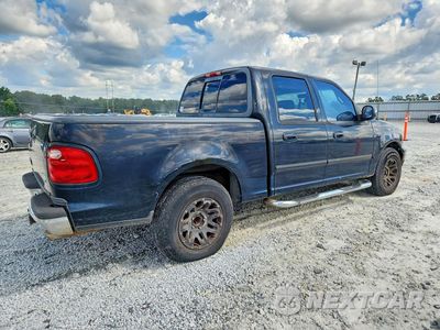 Trzecie zdjęcie samochodu z tyłu: 2001 FORD F150 SUPERCREW VIN:1FTRW07L81KB86589 - miniatura