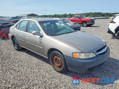 Czwarte zdjęcie samochodu z boku: 2001 NISSAN ALTIMA XE VIN:1N4DL01D61C142871 - miniatura