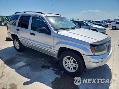 Czwarte zdjęcie samochodu z boku: 2004 JEEP GRAND CHEROKEE LAREDO VIN:1J4GX48S04C386019 - miniatura