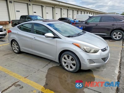 Czwarte zdjęcie samochodu z boku: 2012 HYUNDAI ELANTRA LIMITED VIN:KMHDH4AE2CU352355 - miniatura