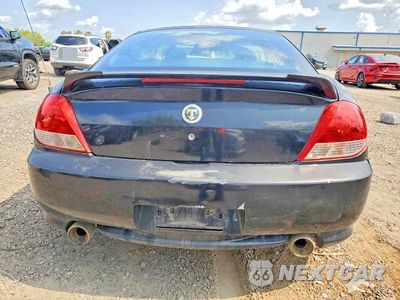 Zdjęcie 6 z 12 samochodu: 2006 HYUNDAI TIBURON GS VIN:KMHHM65D46U210961 - miniatura