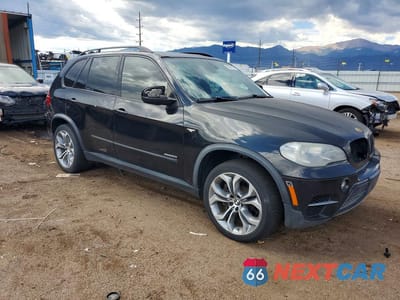 Czwarte zdjęcie samochodu z boku: 2012 BMW X5 XDRIVE50I VIN:5UXZV8C55CL424824 - miniatura