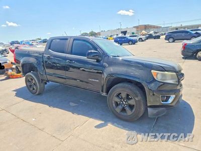 Czwarte zdjęcie samochodu z boku: 2016 CHEVROLET COLORADO LT VIN:1GCGSCE3XG1371877 - miniatura