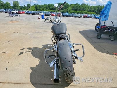 Czwarte zdjęcie samochodu z boku: 2000 HONDA VT1100 T VIN:1HFSC3701YA201084 - miniatura