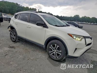 Czwarte zdjęcie samochodu z boku: 2018 TOYOTA RAV4 LE VIN:JTMBFREVXJJ180910 - miniatura