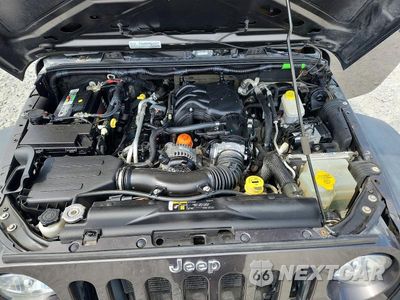 Zdjęcie 12 z 14 samochodu: 2018 JEEP WRANGLER UNLIMITED SPORT VIN:1C4HJWDG2JL928578 - miniatura