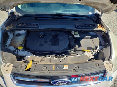 Zdjęcie 11 z 12 samochodu: 2014 FORD ESCAPE TITANIUM VIN:1FMCU0J94EUE20287 - miniatura
