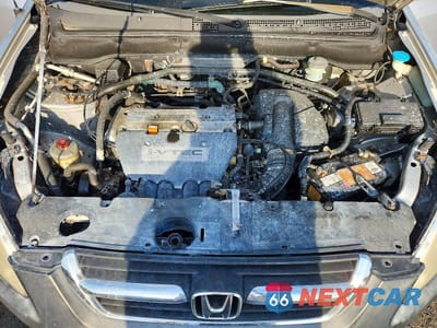 Zdjęcie 12 z 13 samochodu: 2002 HONDA CR-V LX VIN:JHLRD78472C021881 - miniatura