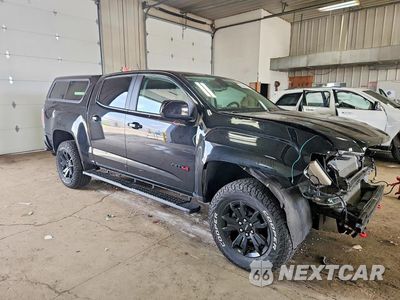 Czwarte zdjęcie samochodu z boku: 2022 GMC CANYON AT4 VIN:1GTG6FEN8N1161718 - miniatura