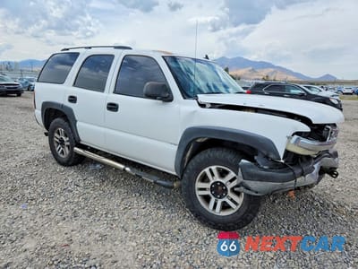 Czwarte zdjęcie samochodu z boku: 2006 CHEVROLET TAHOE K1500 VIN:1GNEK13T26R144432 - miniatura